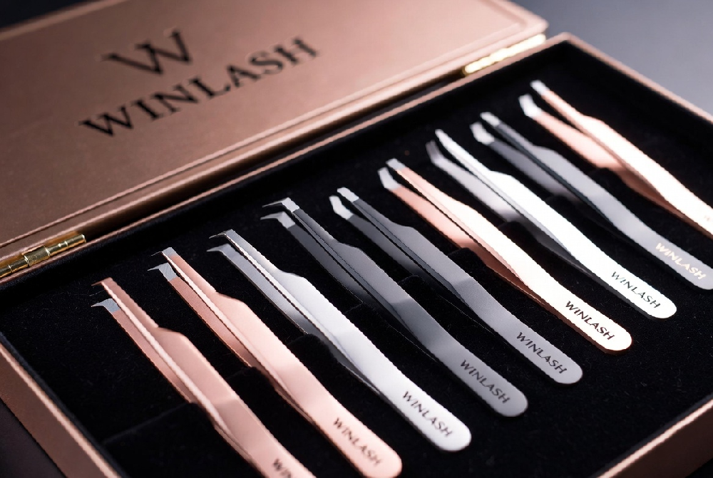 Premium collection of WINLASH and Vetus professional lash tweezers in rose gold and silver finishes