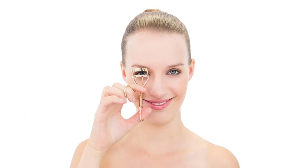 Lash Glue Duration Guide: Survive Dubai Heat & Humidity with WinLash Pro Adhesives |winlash How Long Does Lash Glue Last in Dubai Humidity? Woman applying strip lashes with strong adhesive for 48-hour hold in hot climate |winlash