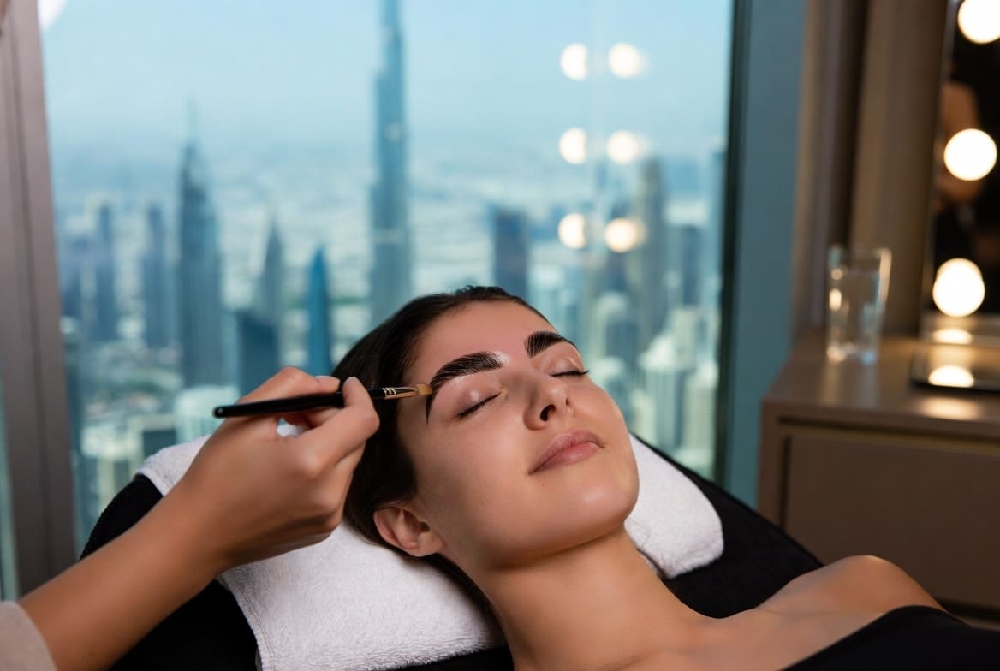 Brow Lamination in Dubai: Perfect Results in Hot and Humid Climate | Winlash Professional brow lamination treatment in Dubai luxury salon with city skyline view